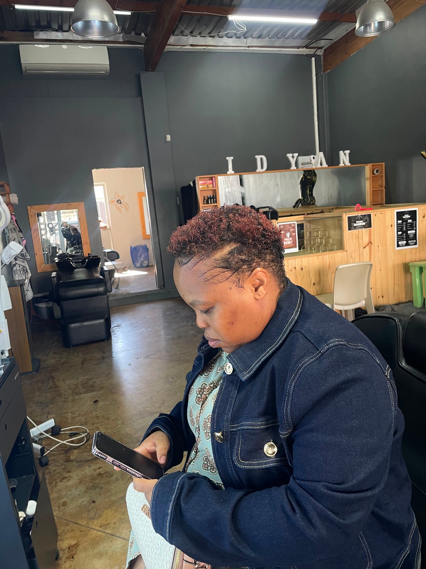 S-Curl treatment finished with a clean cut at Idyan Barber